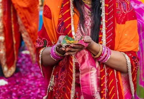 Indian devotee doing holy rituals at chhath festival at morning Фото