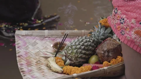 Indian devotee worshiping hindu almighty sun god with holy coconut offering.. Stock Footage 275876044