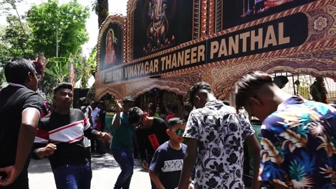 Indian devotees dance at Sri Sithi Vinayagar Thaneer Panthal during Thaipusam. Stock Footage 141763840