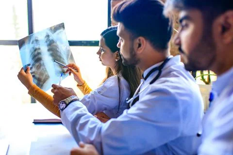 Indian doctors are checking examining chest x-ray film Stock Photos