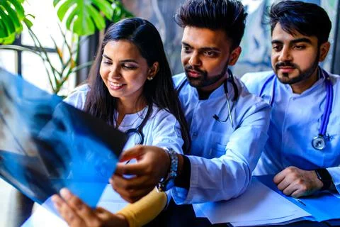 Indian doctors are checking examining chest x-ray film Stock Photos