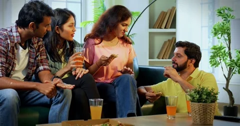 Indian Eating pizza while having conversation, youth chat, share thoughts Stock Footage 342384536