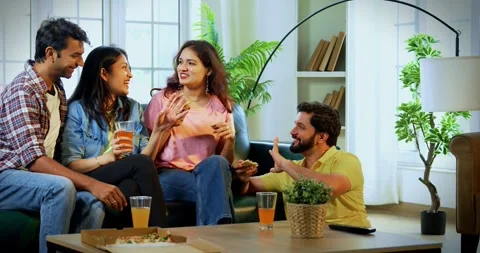 Indian Eating pizza while having conversation, youth chat, share thoughts Stock Footage 342384548