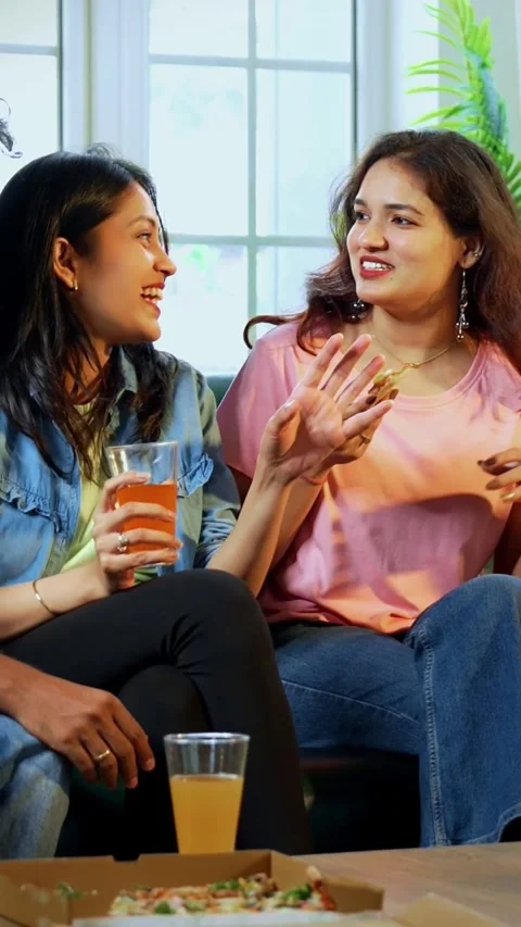 Indian Eating pizza while having conversation, youth chat, share thoughts Stock Footage 342385158