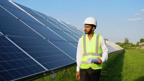 Indian engineer checking solar panels Stock Footage 246814617