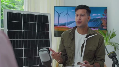 Indian Engineer Podcasting about Wind Turbines Production Stock Footage 301297004