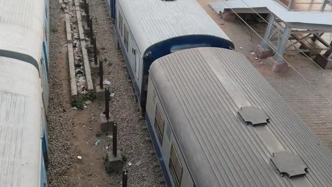 Indian express train running through over a bridge Stock Photos