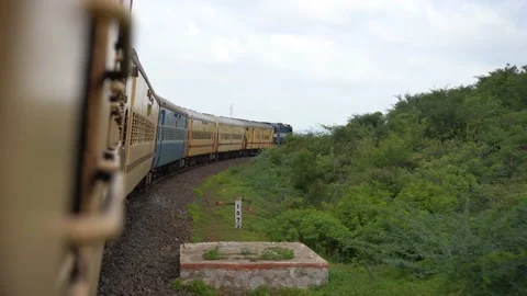 Indian express train running on tracks Stock Footage 177914208