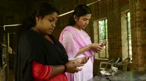 Indian Family Making Handmade Clay Jewellery Stock Footage 58060164