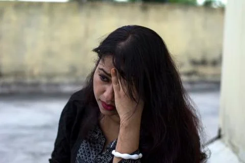 Indian female model looking side unhappy face Stock Photos