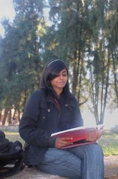 Indian female reading her notes before examination Stock Photos