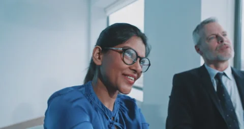 Indian female recruiter smiling while shaking hand with candidate Stock Footage 208041538
