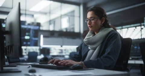 Indian Female Software Developer Working in Office Stock Footage 243552577