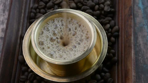Indian Filter Coffee in a brass cup Stock Footage 156403497