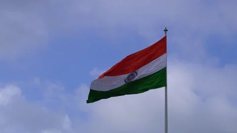 A indian flag is flying in blue sky Stock Footage 247373882