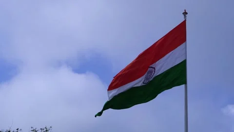 A indian flag is flying in blue sky Stock Footage 247373884
