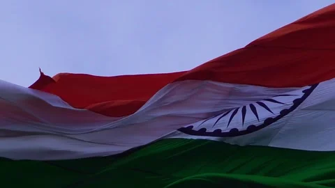 A indian flag is flying in blue sky Stock Footage 247373930