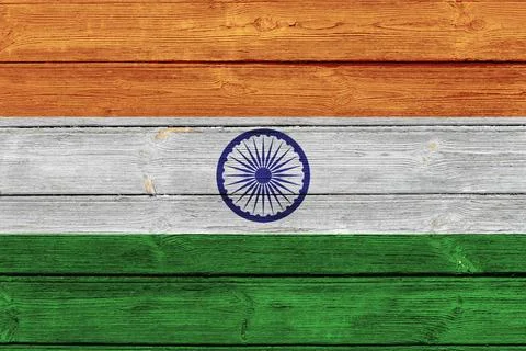 Indian flag on an old wooden surface with cracked paint. Stock Illustration