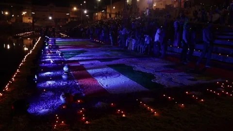 Indian Flag Rangoli  Drawing with Lighting Show in Night at Lake Stock Footage 135382049