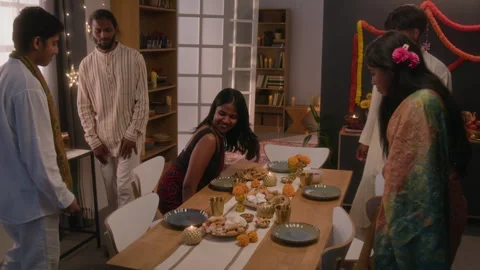 Indian Friends Sitting at Festive Dining Table during Celebration Stock Footage 344952485