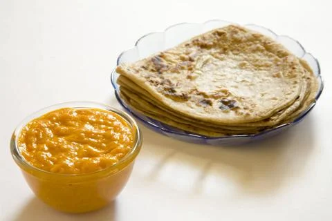 Indian fruit mango pulp with paratha Indian bread served in bowls and plat... Stock Photos