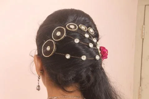 Indian girl engagement hairstyle. Stock Photos