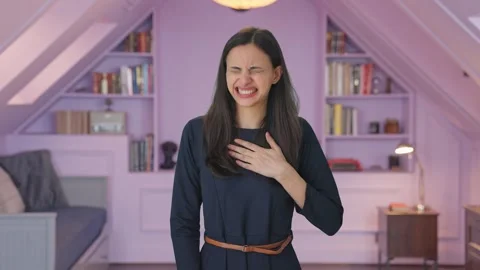 Indian girl having acidity problem Stock Footage 250282472