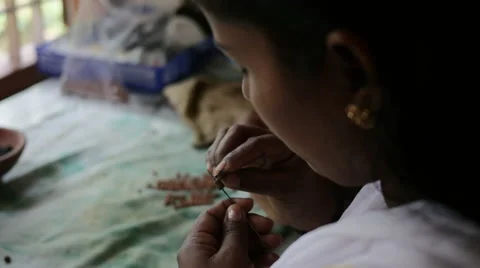 Indian Girl making Handmade Clay Jewellery Stock Footage 58068828