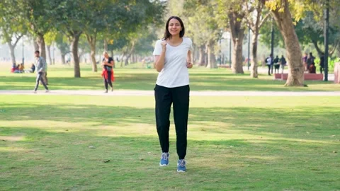 Indian girl practicing for marathon Stock Footage 230572425