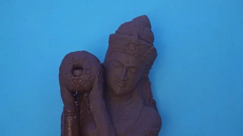 Indian goddess with a pot of water Stock Footage 272748595