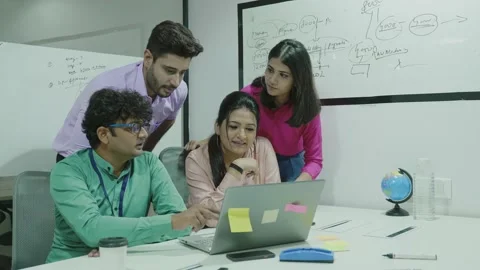 Indian group brainstorming on digital project discussing strategy plan. Stock-Footage 168283033