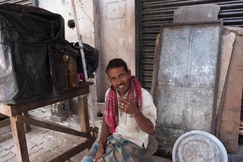 Indian guy poses to tourists Stock Photos