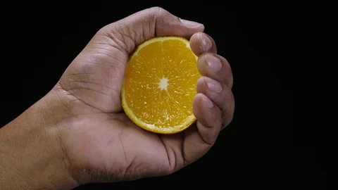Indian hand Orange Squeeze Video stock 128842399