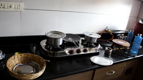 Indian Home Kitchen Interior with Gas Stove and Cookware Ready for Meal Stock Footage 336559420