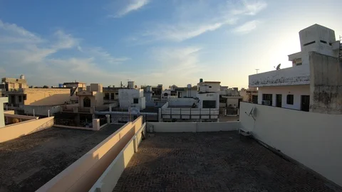 Indian House Rooftops evening Time Lapse Stock Footage 128744518
