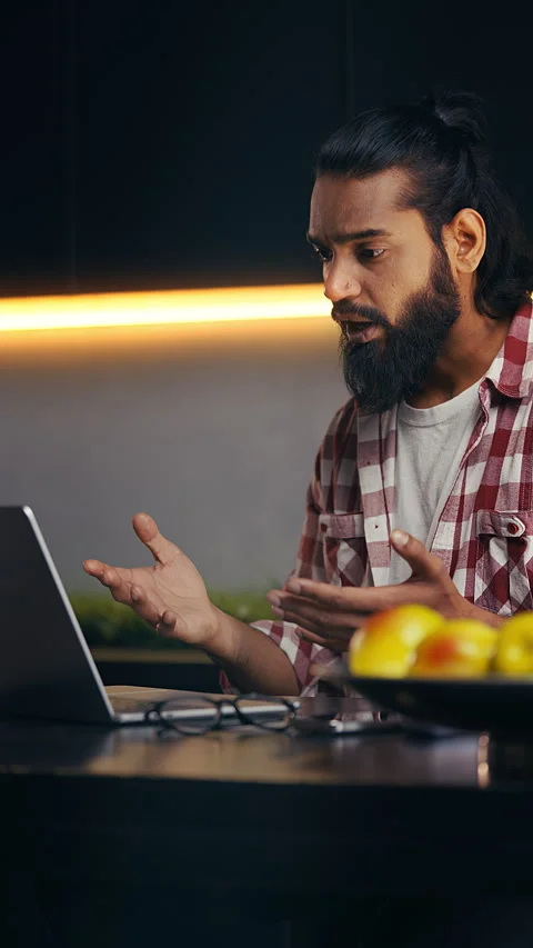 Indian IT developer in online video call with boss on laptop, business work Stockbeeldmateriaal 316838196