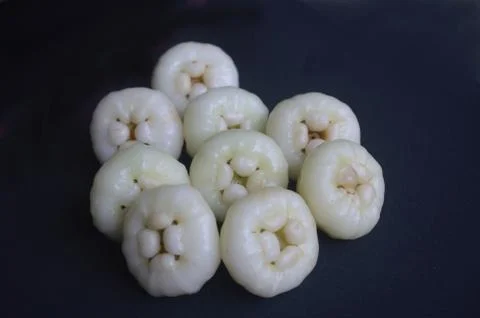 Indian juicy summer fruit Java apple present on black background Stock Photos