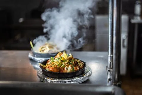 Indian kebab platter in sizzling plate Stock Photos