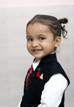 Indian kid cute expression getting ready for photo shoot in shirt and tie a.. 写真素材