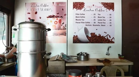 Indian lady preparing indian filter coffee Stock Footage 65989021