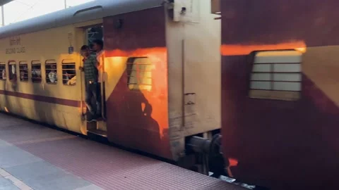 An Indian local train stops at a railway station in Jharkhand, India. Stock Footage 219991664