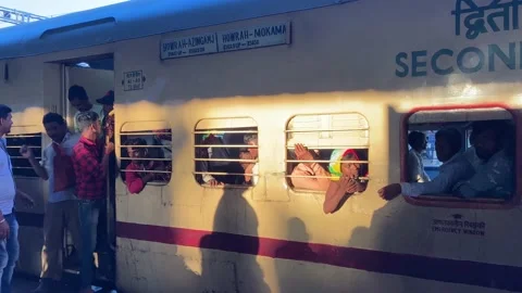 An Indian local train stops at a railway station in Jharkhand, India. Stock Footage 219991667