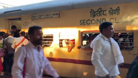 An Indian local train stops at a railway station in Jharkhand, India Stock Footage 219991697