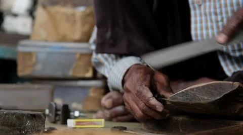 Indian lock smith shaping keys Stock Footage 65780897