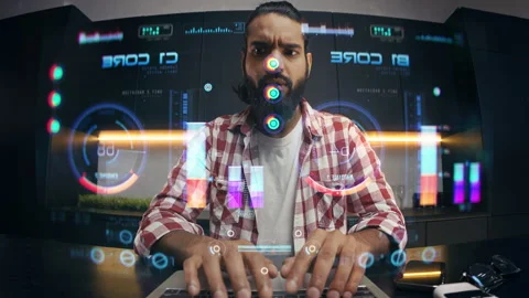 Indian male engineer attempting to launch program on futuristic computer display Stock Footage 329506667