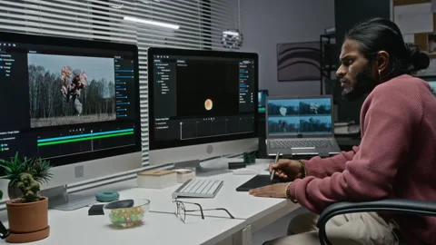 Indian Man Creating Cgi Visual Effects on Computer in Studio Stock Footage 348352152