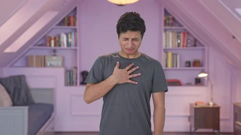 Indian man having acidity problem Stock Footage 252939983