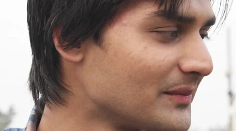 An Indian man looking at the camera and making faces Stock Footage 59513022