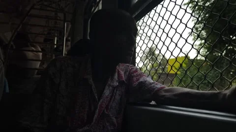 Indian Man Looking Out Window Of Moving Local Train In India Stock Footage 333541454