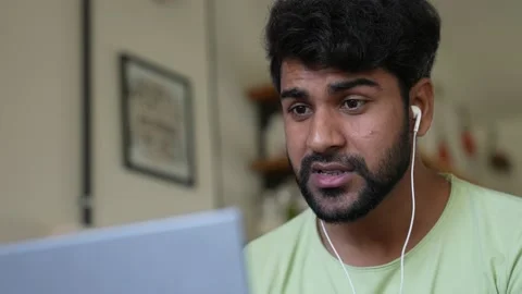 Indian man making video call using laptop for consulting about New project. Vídeo Stock 154160030